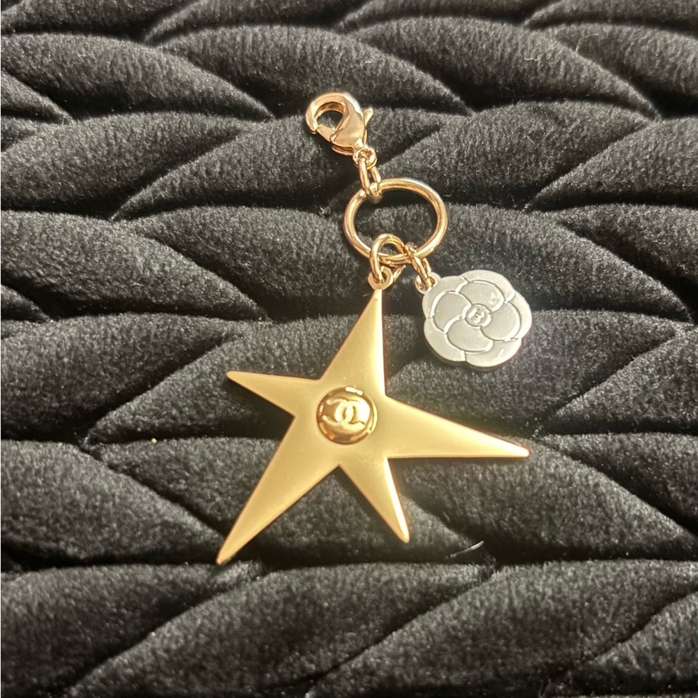 CHANEL Limited edition Gold Comete and Silver Flower Charm